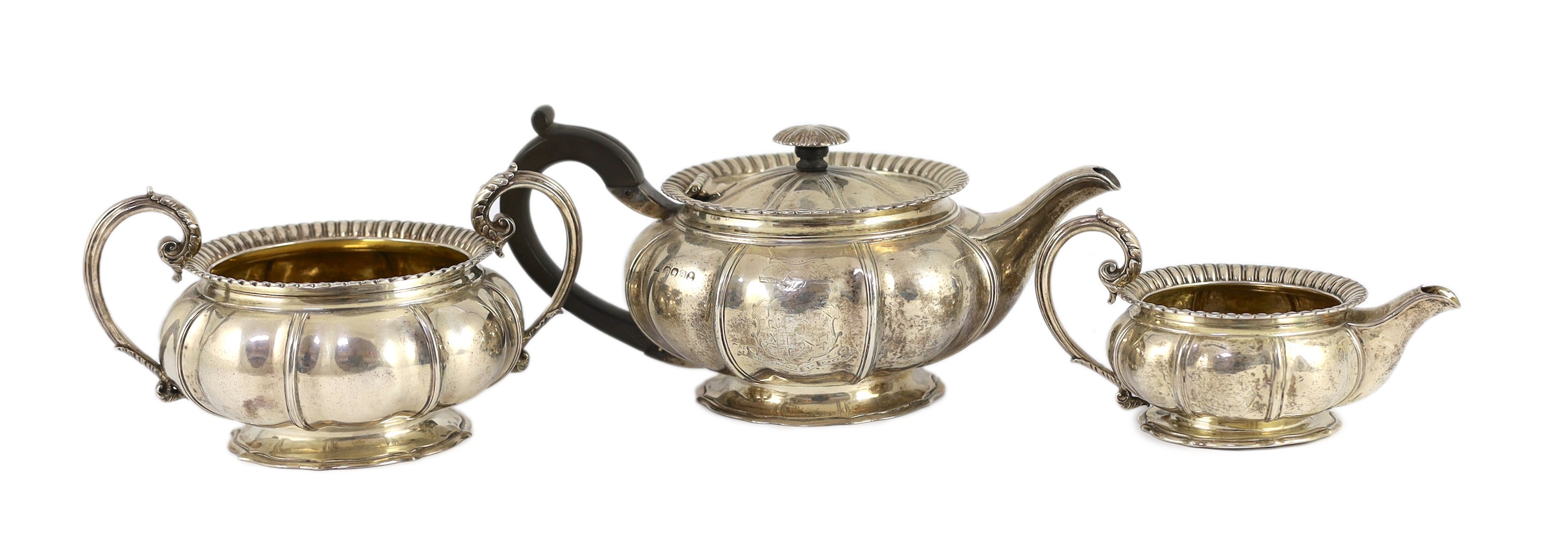 A George IV silver three piece tea set by Benjamin Smith III